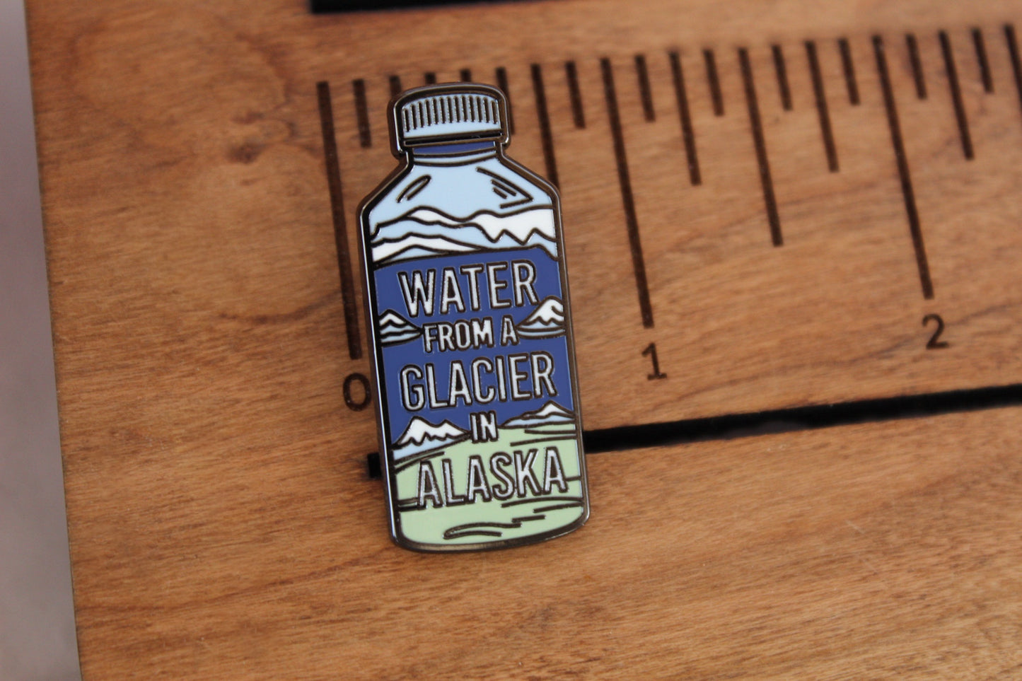 Water From A Glacier In Alaska Waterboy Enamel Pin