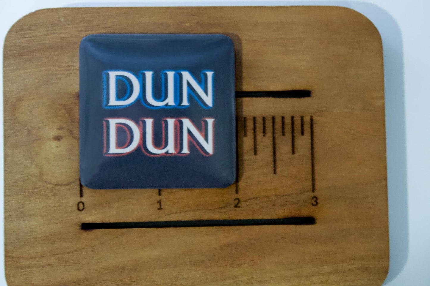 Dun Dun Law and Order Refrigerator Magnet 2x2in